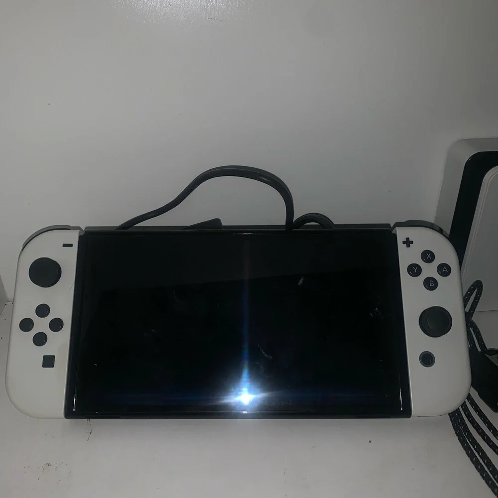 Nintendo Switch OLED game console (everything included)
